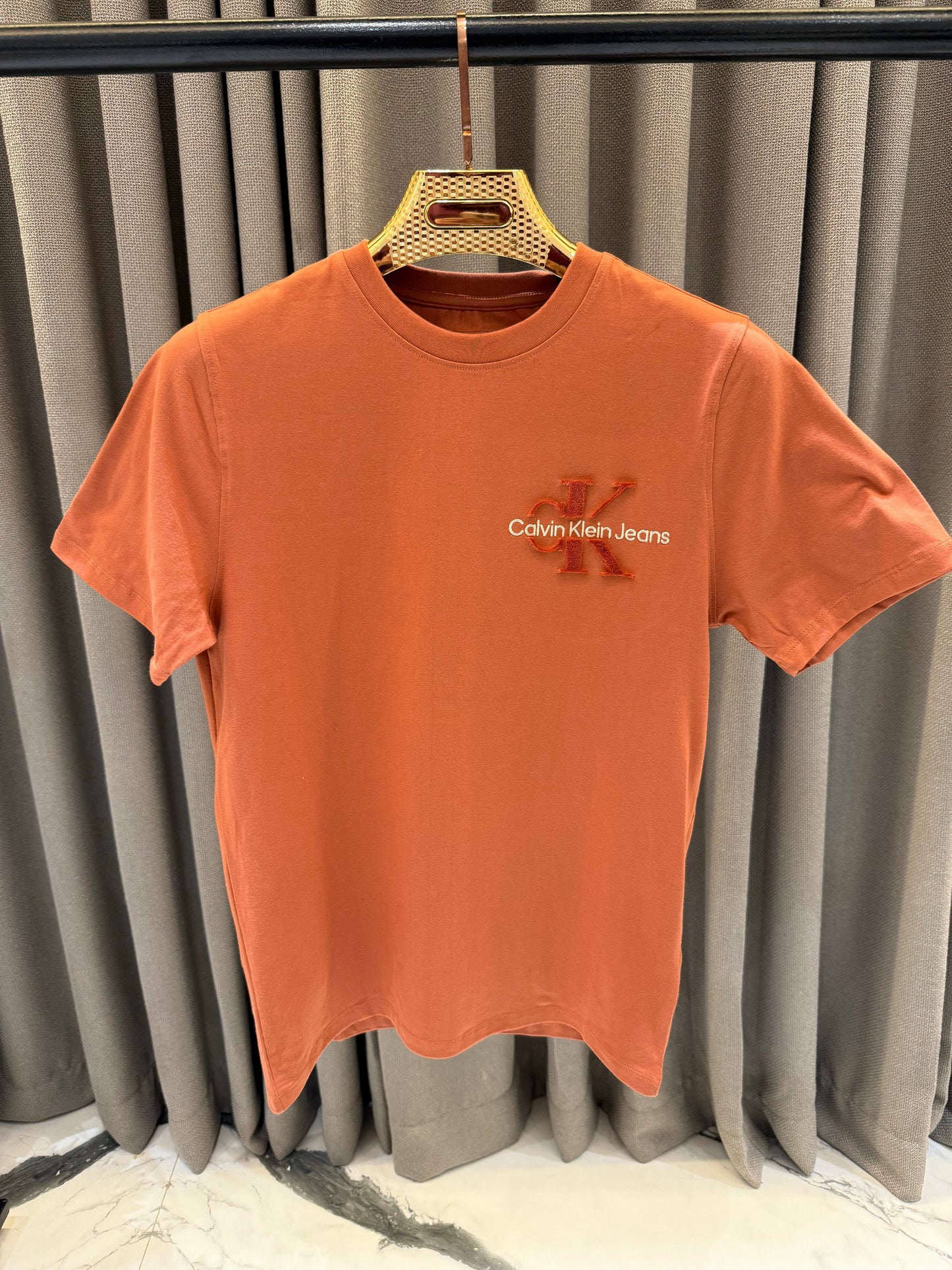 CALVIN KLEIN LIGHT ORANGE EMBOSSED PRINTED TSHIRT C1